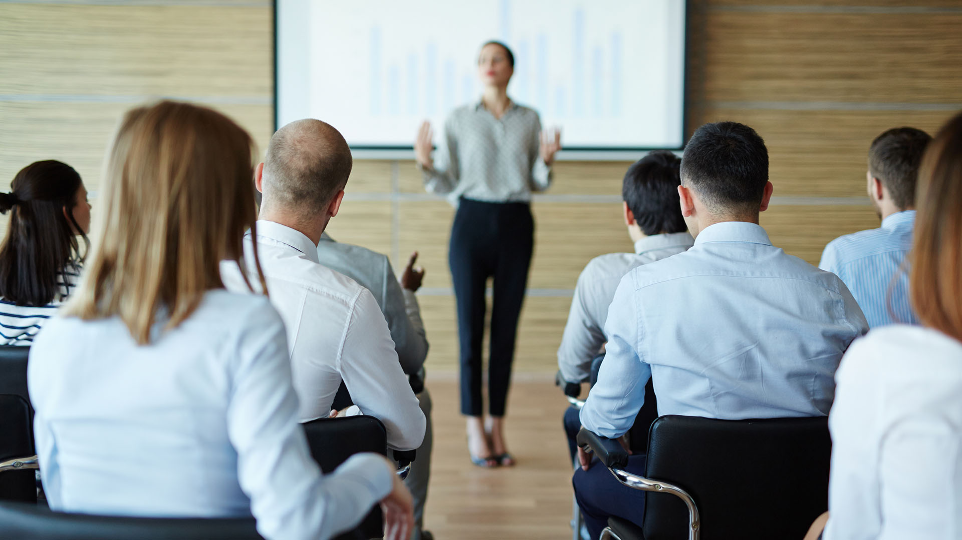 People listening to seminar speaker